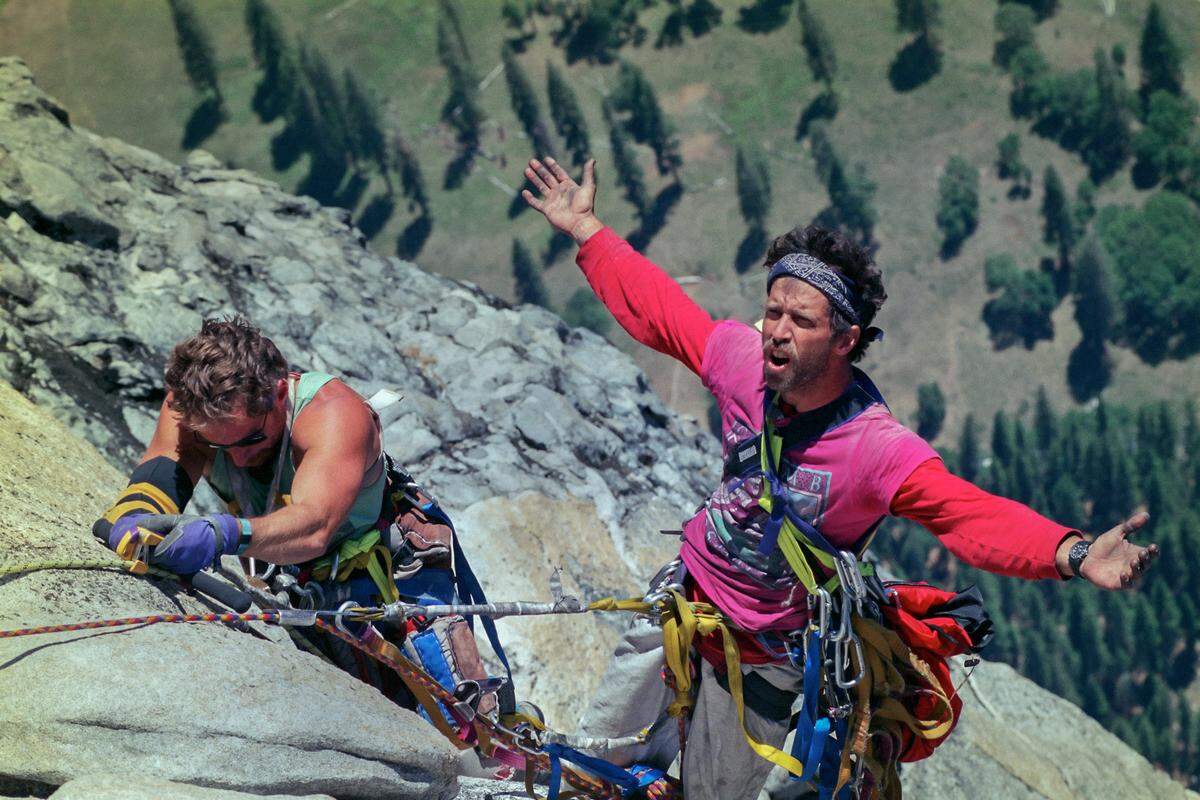 Mike Corbett, right, claims victory at the summit of El Capitan with Mark Wellman, July 1989.