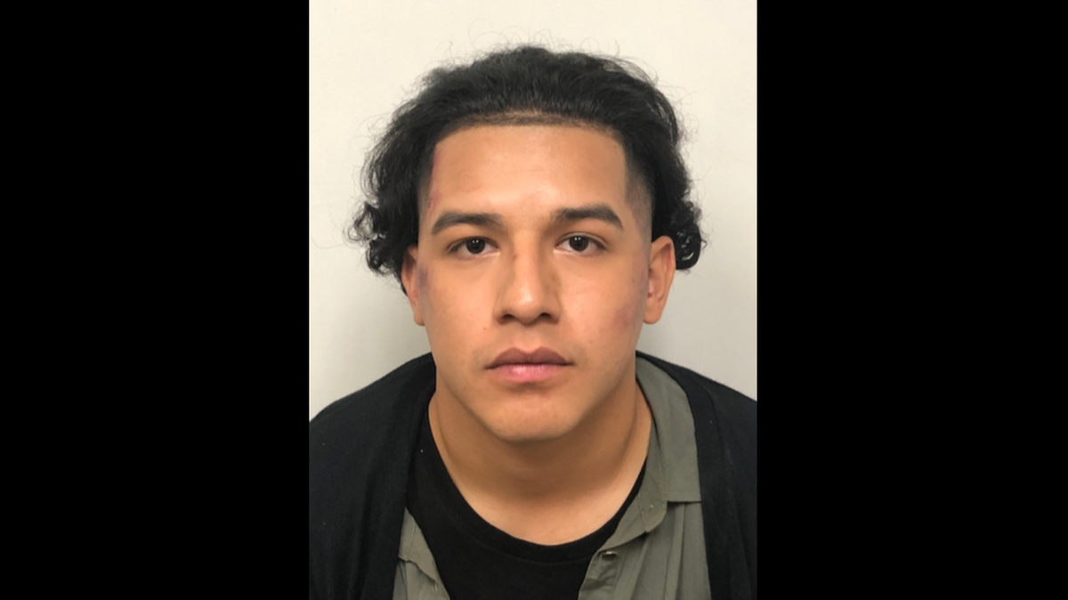 Nathaniel Holguin, 25, was arrested after police say he robbed two banks in Visalia.