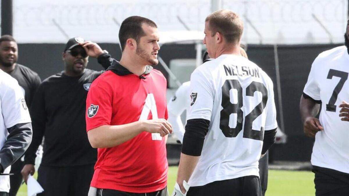 Derek Carr interacts with Jordy Nelson at the Oakland Raiders voluntary veteran mini-camp on Tuesday, April 24, 2018.