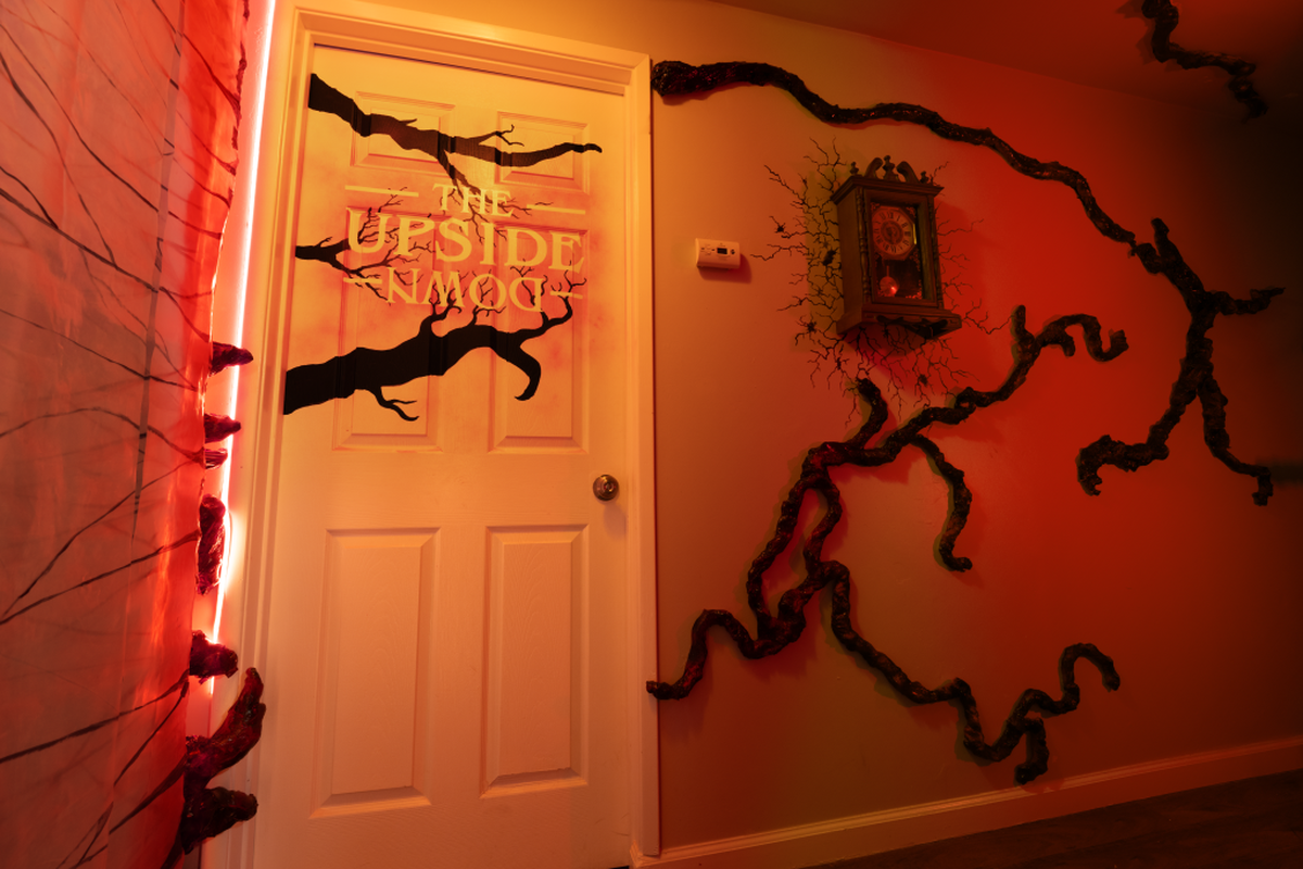 The door to a room in a “Stranger Things”-themed house in Clovis references the Upside Down, a key plot point in the hit Netflix show.