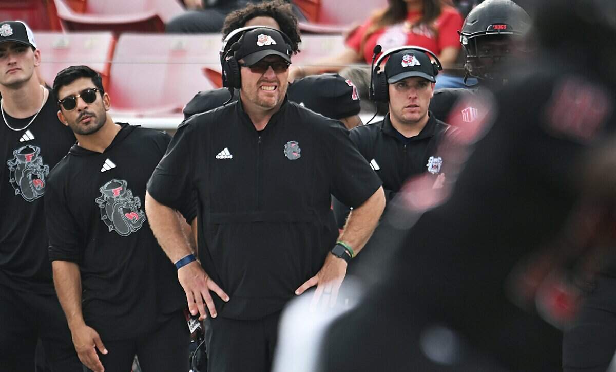 Fresno State head coach Matt Entz, center, is seen along the sideline against San Diego State Saturday, Oct. 24, 2025 in Fresno.