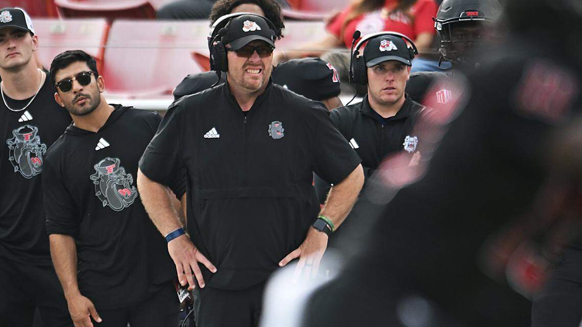 Fresno State head coach Matt Entz, center, is seen along the sideline against San Diego State Saturday, Oct. 24, 2025 in Fresno.