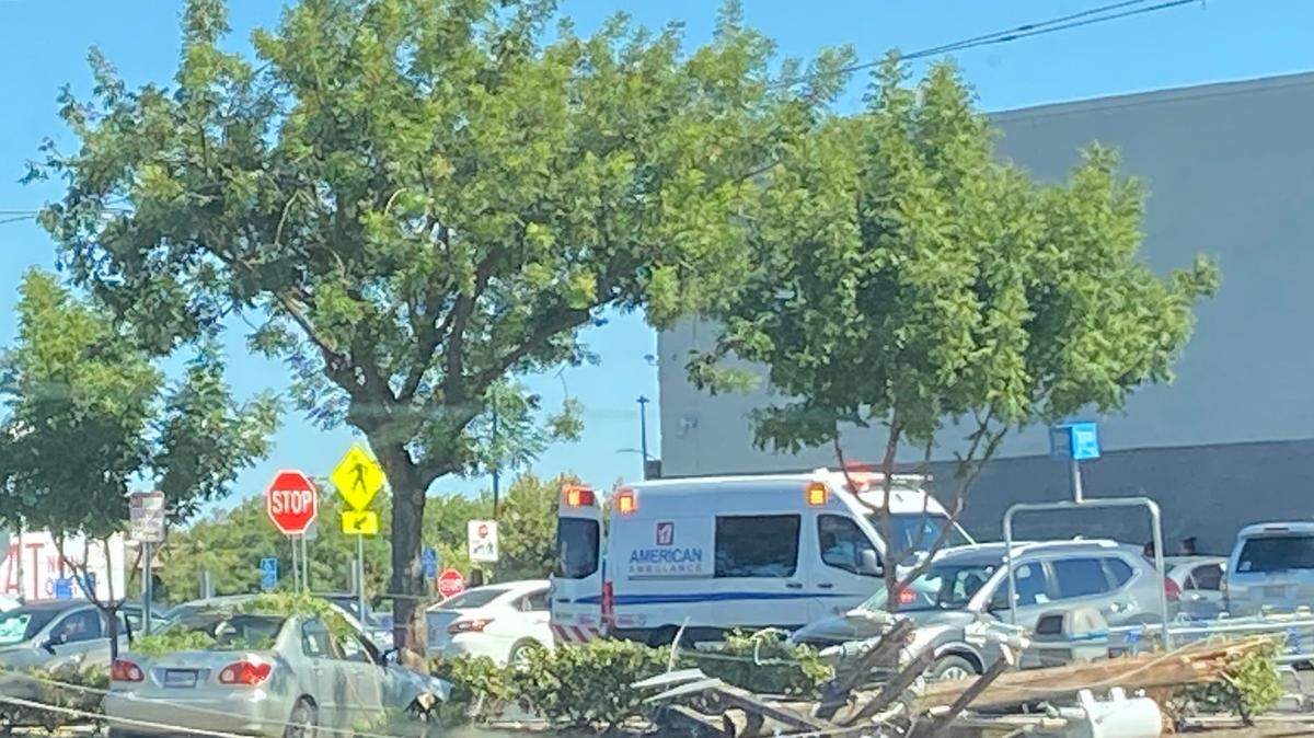 A vehicle crashed into a tree and knocked down a power pole in Fresno, California on Sunday, Aug. 11, 2024.