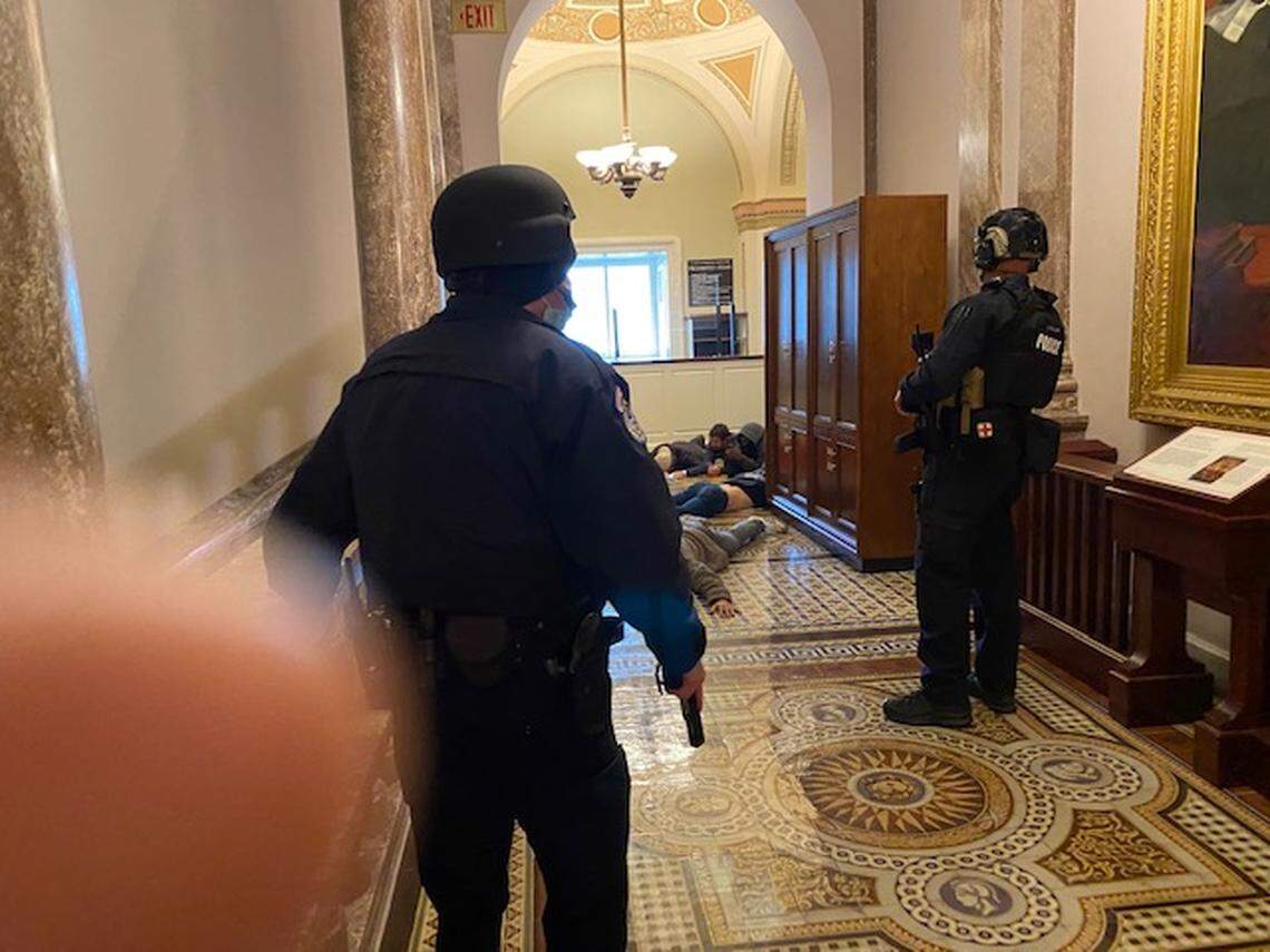 Capitol police making arrests of rioters, who were ordered to the floor.