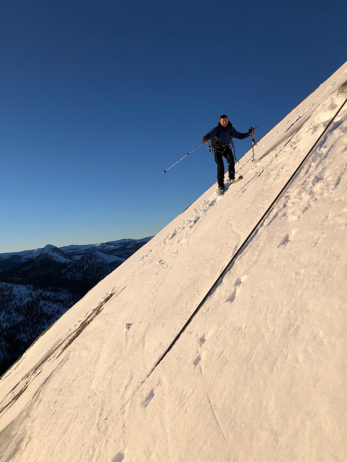 Zach Milligan on the side of Half Dome, Feb. 21, 2021.