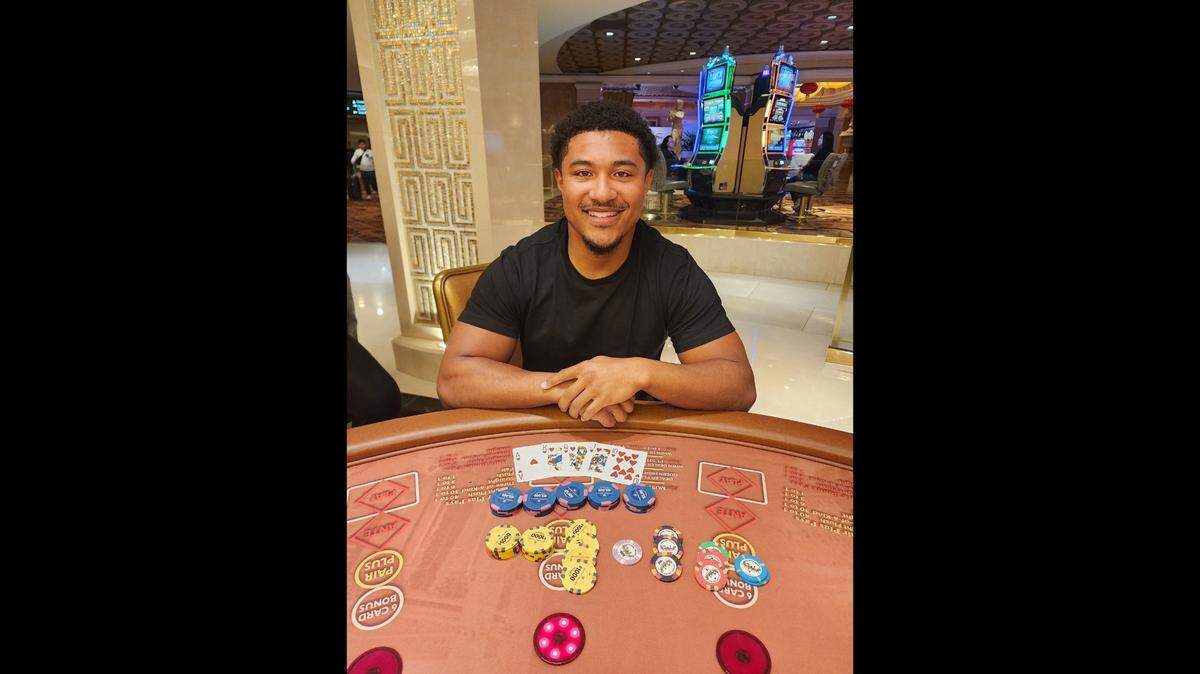 Former Fresno State standout Ronnie Rivers takes a picture after winning $514,837 at Caesars Palace in Las Vegas on Saturday, Feb. 4, 2023.