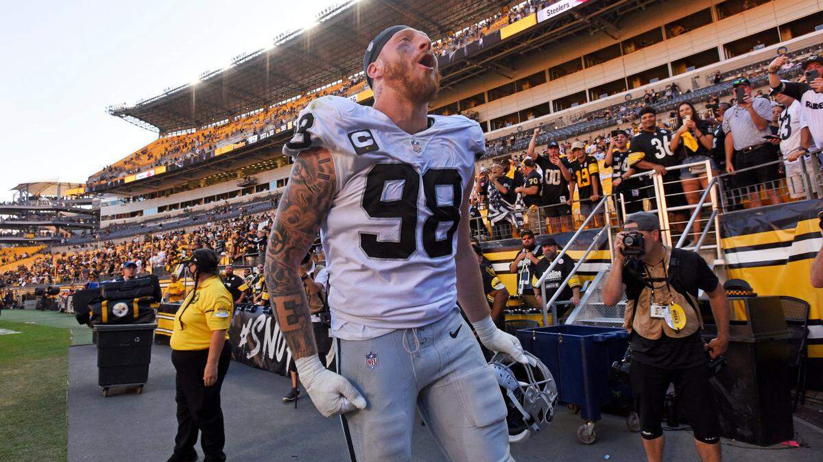 Las Vegas Raiders defensive end Maxx Crosby (98) celebrates as he heads to the locker room following an NFL football game against the Pittsburgh Steelers in Pittsburgh, Sunday, Sept. 19, 2021.