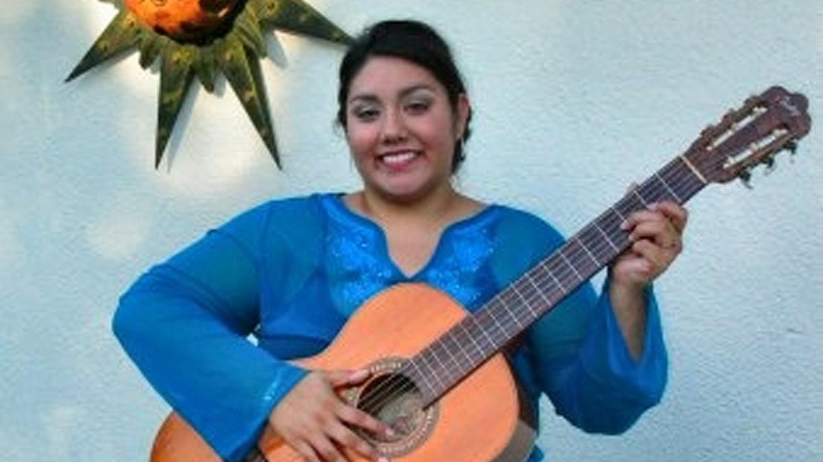 Merlinda Espinosa, singer and guitarist, shown in this undated handout photo from Artes Americas will be performing at the Voces del Valle concert this Friday, September 16, 2005