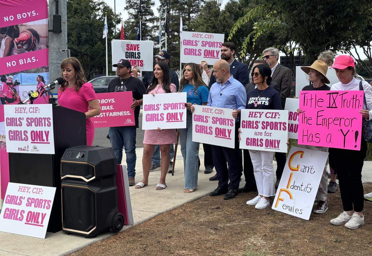 Protesters gathered across the street from Veteran’s Memorial Stadium in Clovis to oppose a transgender athlete’s inclusion in the CIF track and field championships on Friday, May 29, 2026.