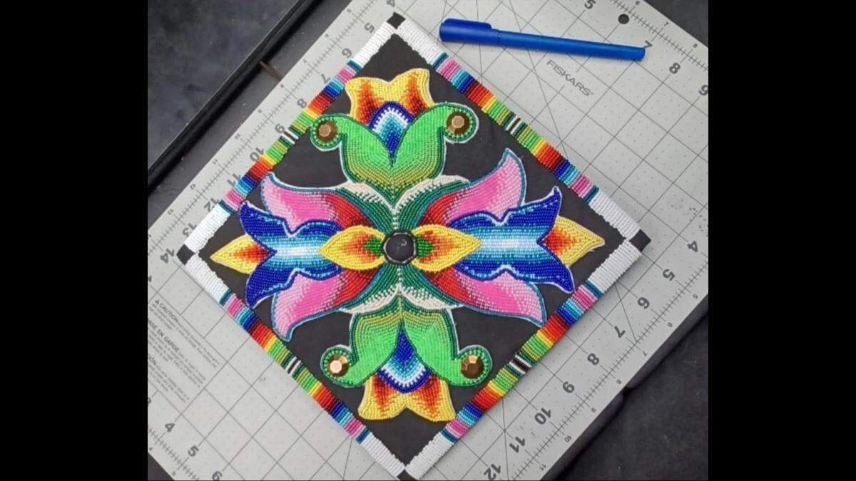 This cap was hand-beaded by members of the Warm Springs Tribe in Oregon and family members of a 16-year-old Hanford Online Charter High School’s senior. The school district, Hanford Joint Union High School District, initially didn’t let the student wear the cap until it authorized all senior class students to decorate their caps too.