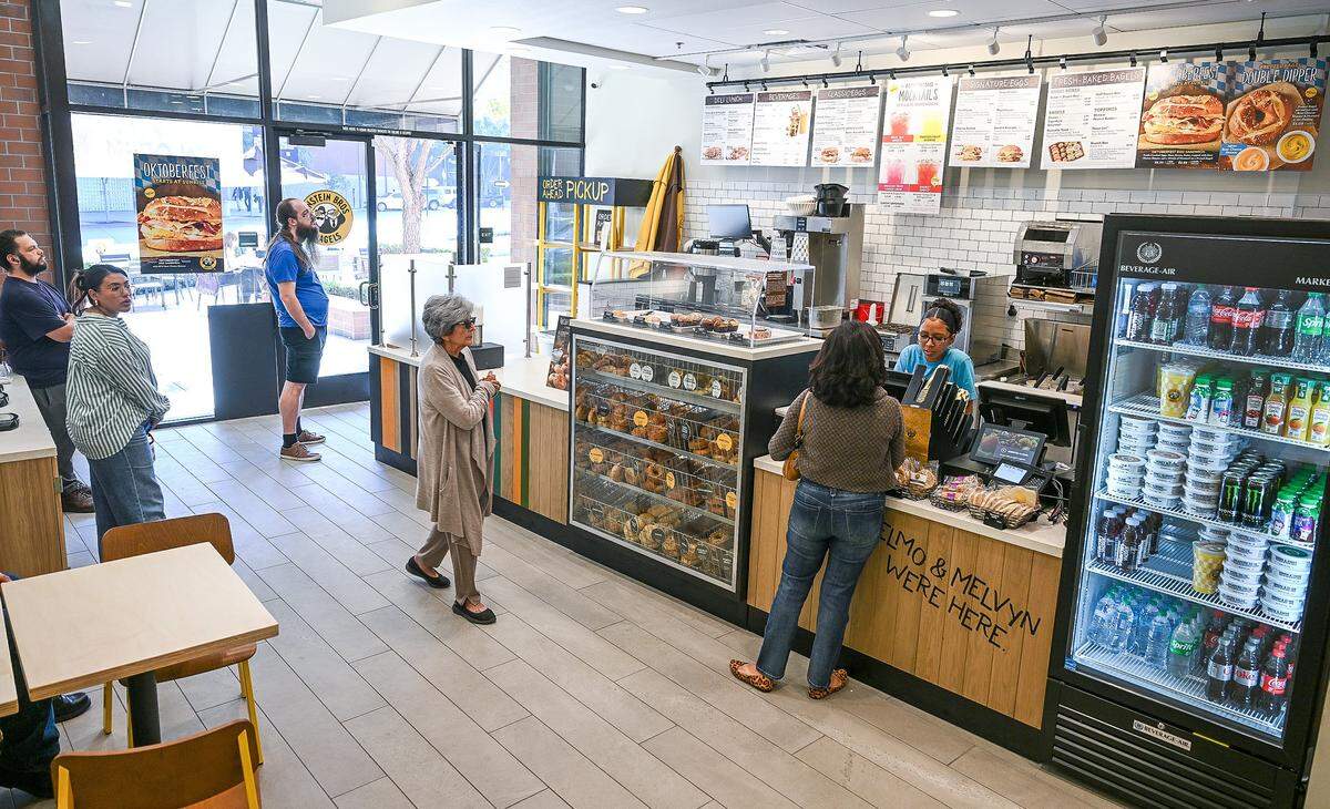 Customers make their orders at the new location for Einstein Bros Bagels, which is now open near the Fresno Convention & Entertainment Center in downtown Fresno.