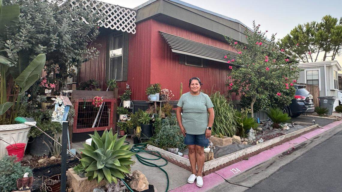Galvia Juarez, a mobile home park resident in front of her home. Juarez says she doesn’t qualify for the city’s current mobile home repair program because her home was built before 1980.