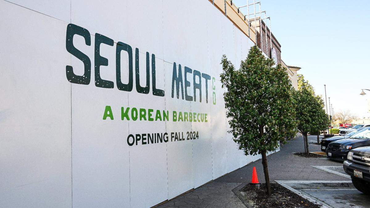 Seoul Meat Co. Korean barbecue has a sign on a storefront facade at Fashion Fair mall that tells of its opening in this file photo from 2024.