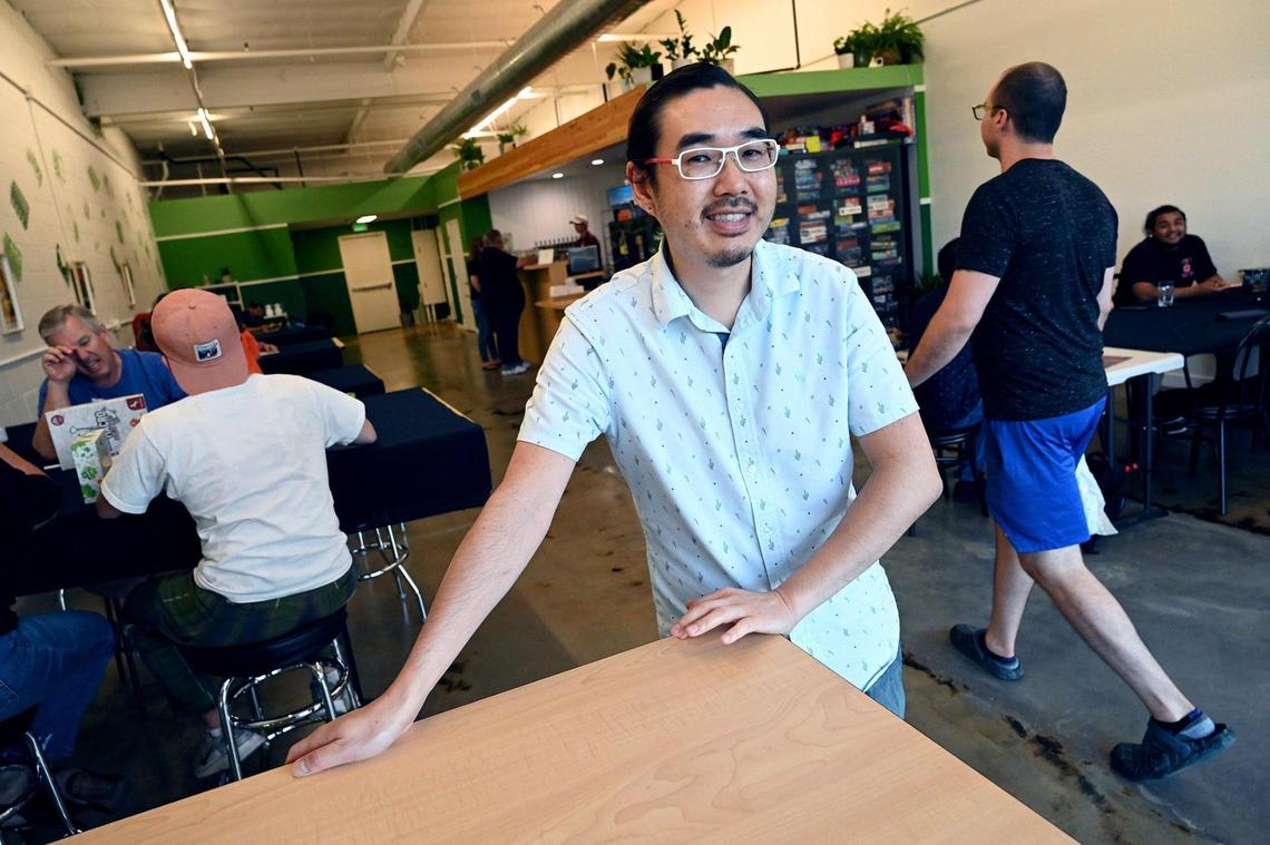 Wilson Lin is the owner of the one month-old Beer for the Meeples which Lin describes as a board game cafe/nerd beer bar, located at the corner of Bullard and Minnewawa avenues in Clovis. Photographed Tuesday afternoon, June 14, 2022.