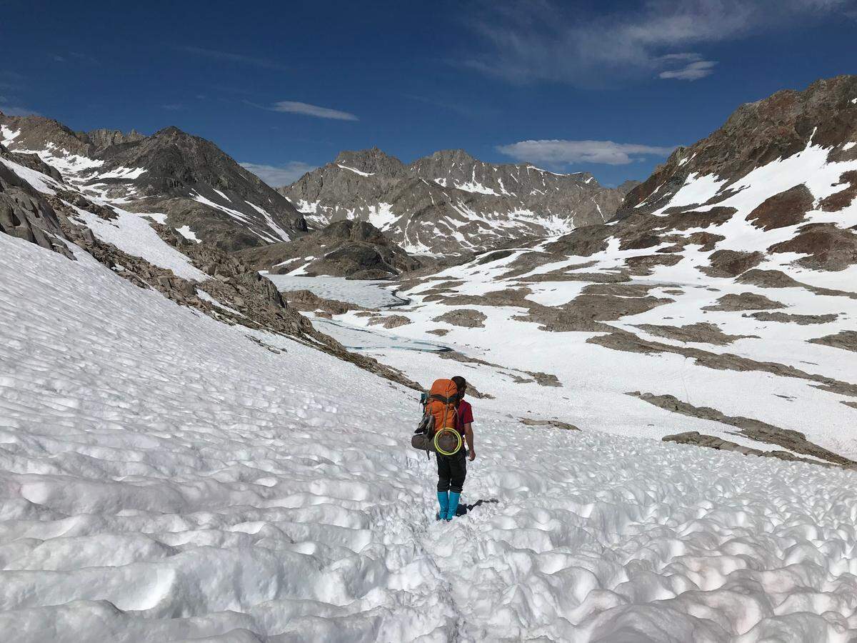 Nicholas Torchia backpacking during a John Muir Trail trip over Muir Pass in 2019.