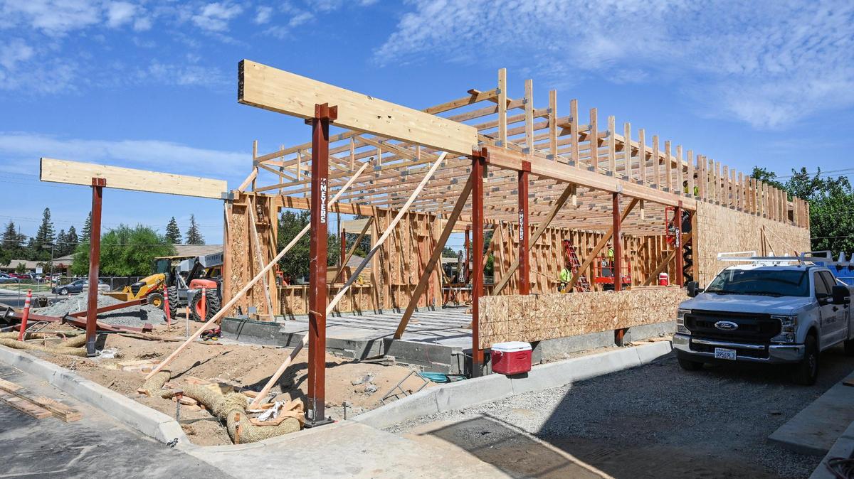 A new Starbucks coffee shop is under construction in the shopping center on the northeast corner of Bullard Avenue and First Street in Fresno on Tuesday, Aug. 2, 2022.