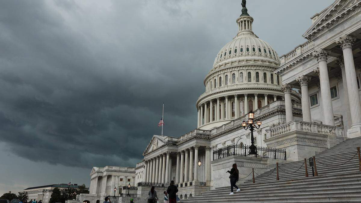 A storm cloud hangs over the U.S. Capitol Building on May 16, 2022, in Washington, DC.