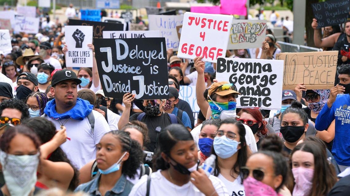 Marchers fill Mariposa Mall in front of the Fresno Police Department on Sunday, May 31, 2020, in protest of the killing of George Floyd in Minneapolis.