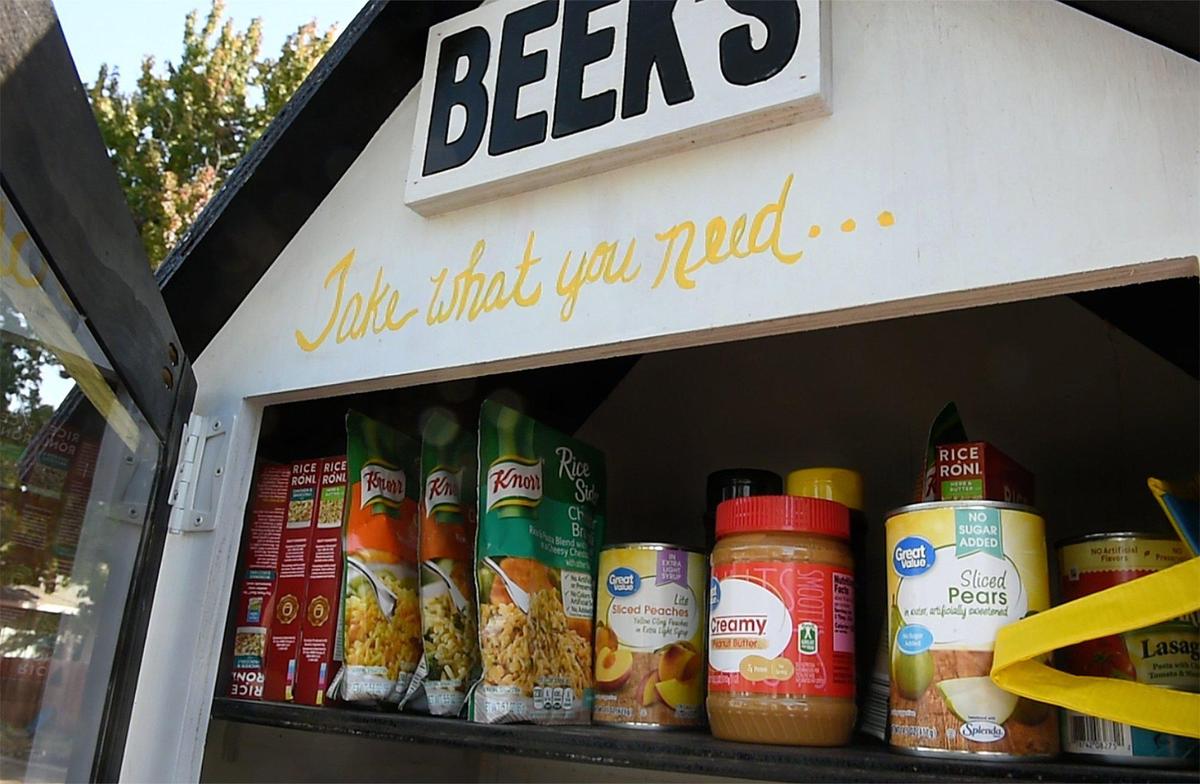 It took only a few minutes for food to fill up Fresno’s first Little Free Pantry, dedicated to Guadalupe Rivera, a victim of a homicide, Wednesday morning, Oct. 30, 2019.