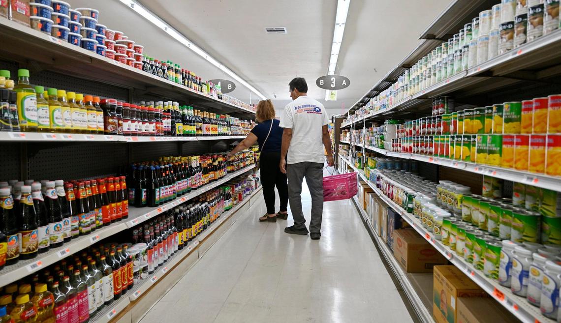 Customers wander the aisles at Nubchi Thao’s new market TBL Asian Market, Thursday, June 22, 2023 in Fresno.
