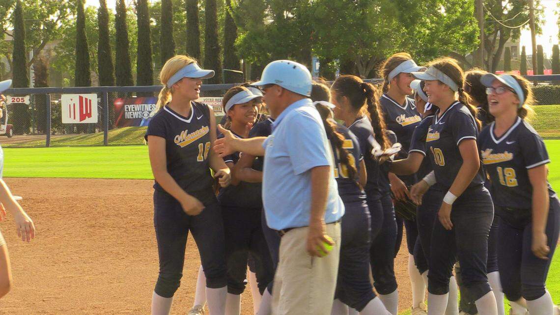 Monache celebrates a Central Section Division III title after a 2-0 victory over Wasco at Margie Wright Diamond on Friday, May 27, 2022.