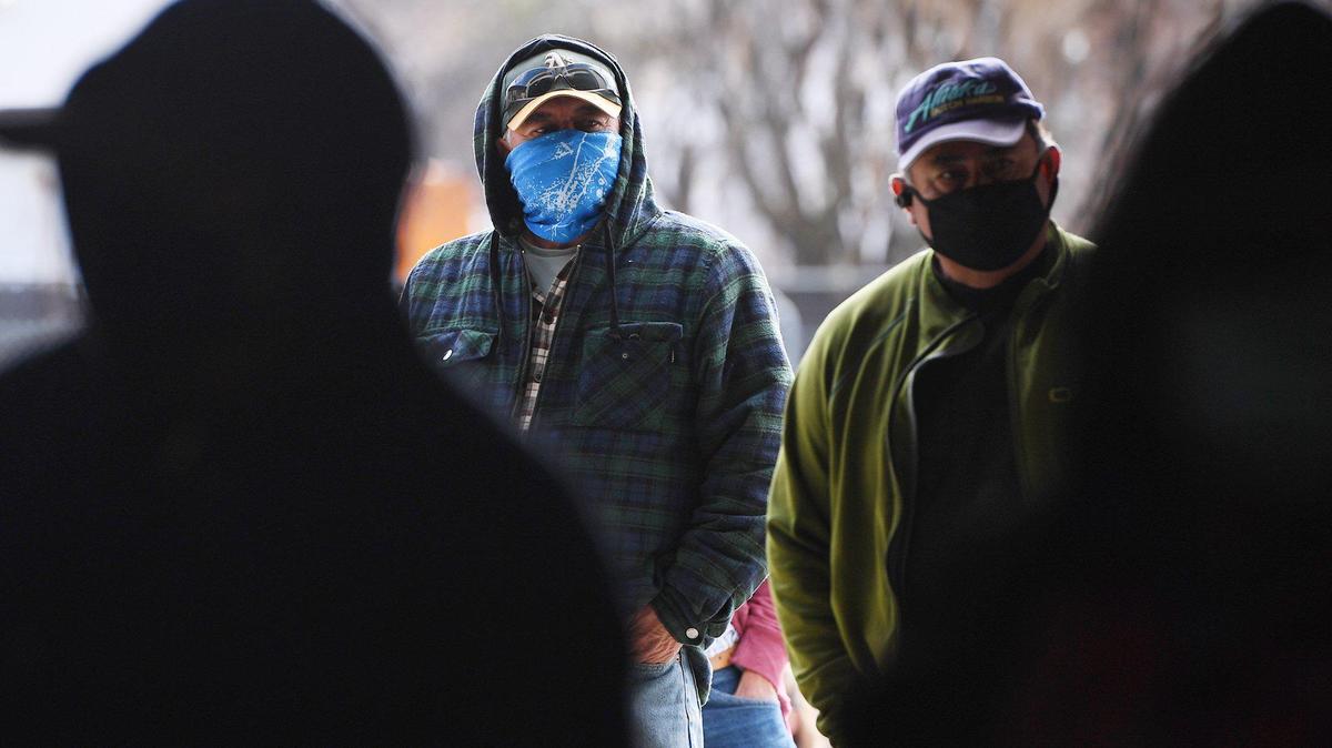 Pappas Family Farm workers line up to receive the COVID-19 vaccine as the Fresno County Department of Public Health, in collaboration with Pappas Family Farm, vaccinated 50 Pappas workers Monday, Jan. 25, 2021 in Mendota. The event is the initial start of vaccinating an estimated 70,000 food and agricultural workers in the county.