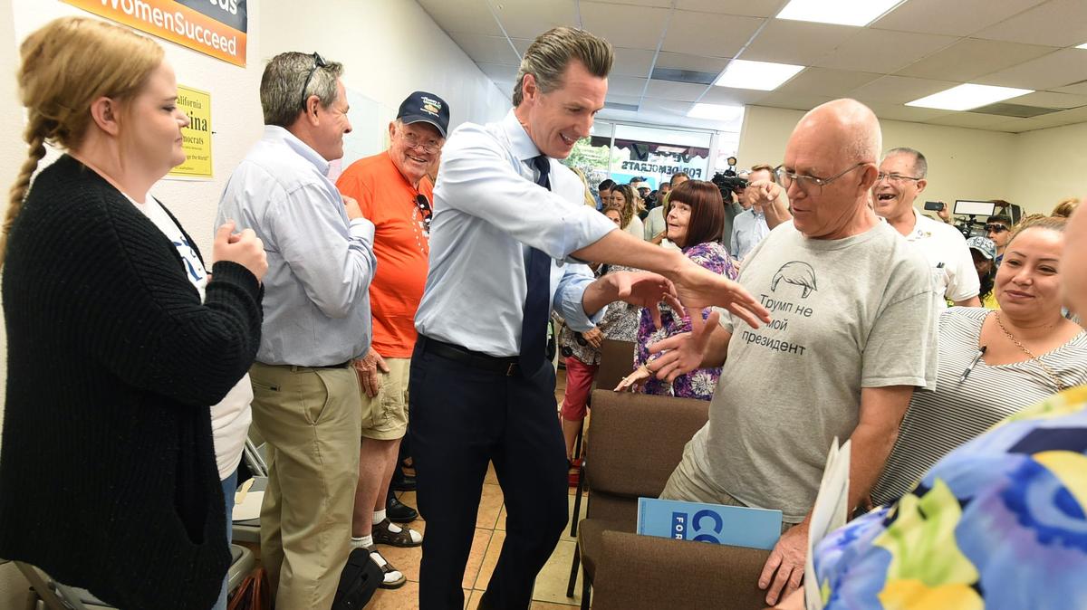 Lt. Governor Gavin Newsom jokes with a supporter as he arrives for a campaign stop at the Fresno Democratic Headquarters in September 2018. Newsom won the statewide race, but was outpolled in Fresno County and neighboring Valley counties by his Republican opponent, San Diego businessman John Cox.