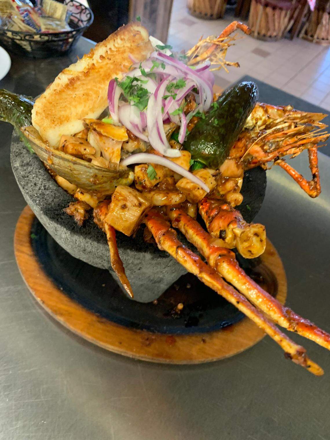 The seafood molcajete at Ceviches & Beer comes with shrimp, octopus, abalone, fish filet, lobster and crab legs.