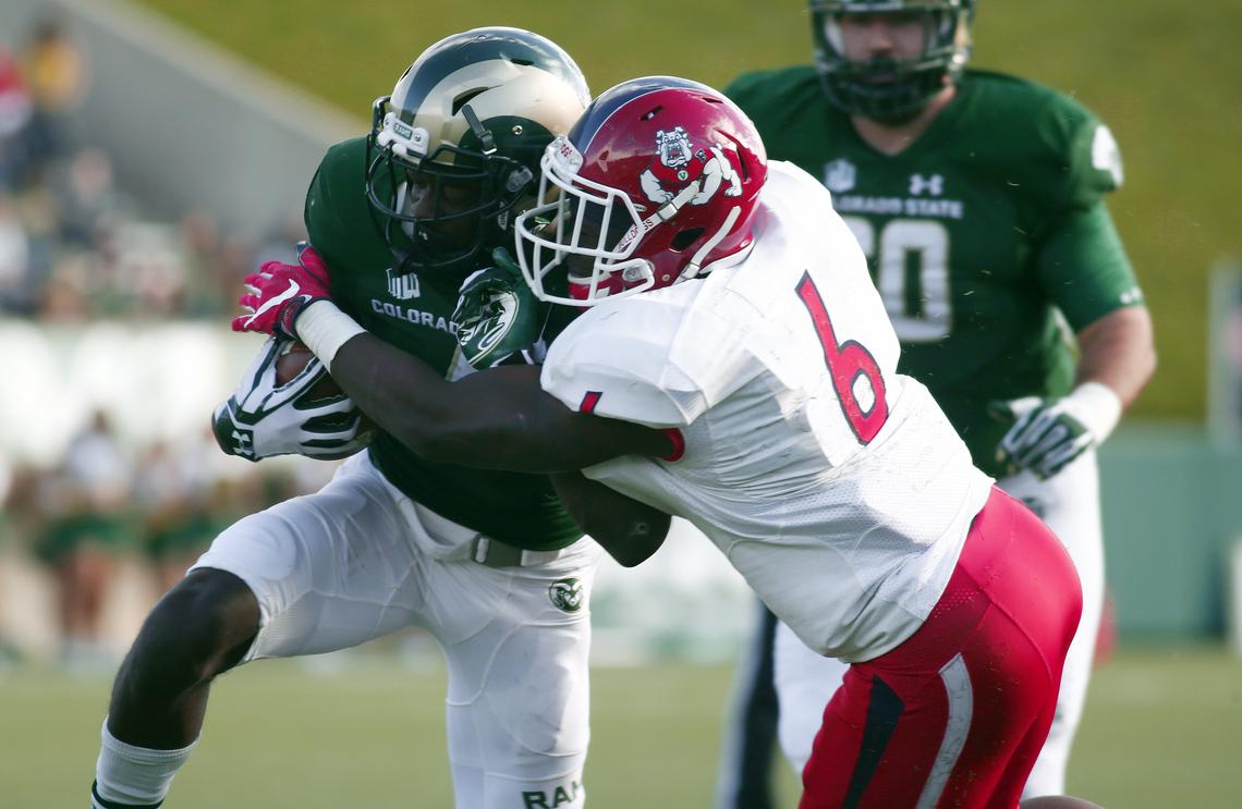 Fresno State cornerback Tank Kelly brings down Colorado State wide receiver Michael Gallup in a 2016 game. Kelly and the Bulldogs’ pass defense will get a severe test from Toledo on Saturday, Sept. 29, 2018 at Bulldog Stadium. The Rockets are seventh in the nation with a 190.91 passing efficiency rating and have three wideouts averaging more than 20 yards per reception.