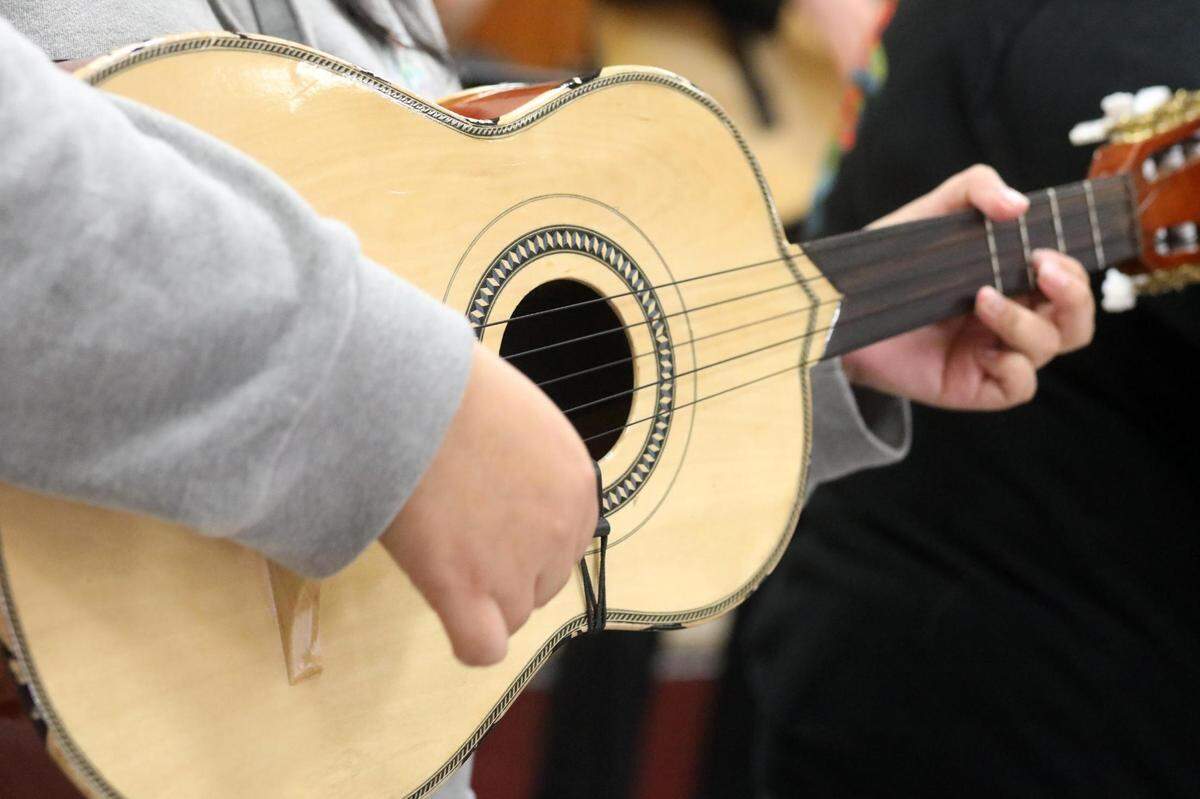 Orosi High School Mariachi Cardenal members during the mariachi class on Wednesday, March 15, 2023.