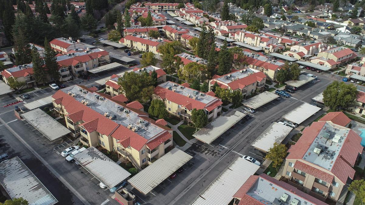 A drone image from 2020 shows a large apartment complex in north Fresno. The median market-rate rent for apartments in Fresno rose by about 4.5% between July 2021 and July 2022, according to ApartmentList.com. The median rent for an apartment was estimated at $1,360 per month in July 2022.