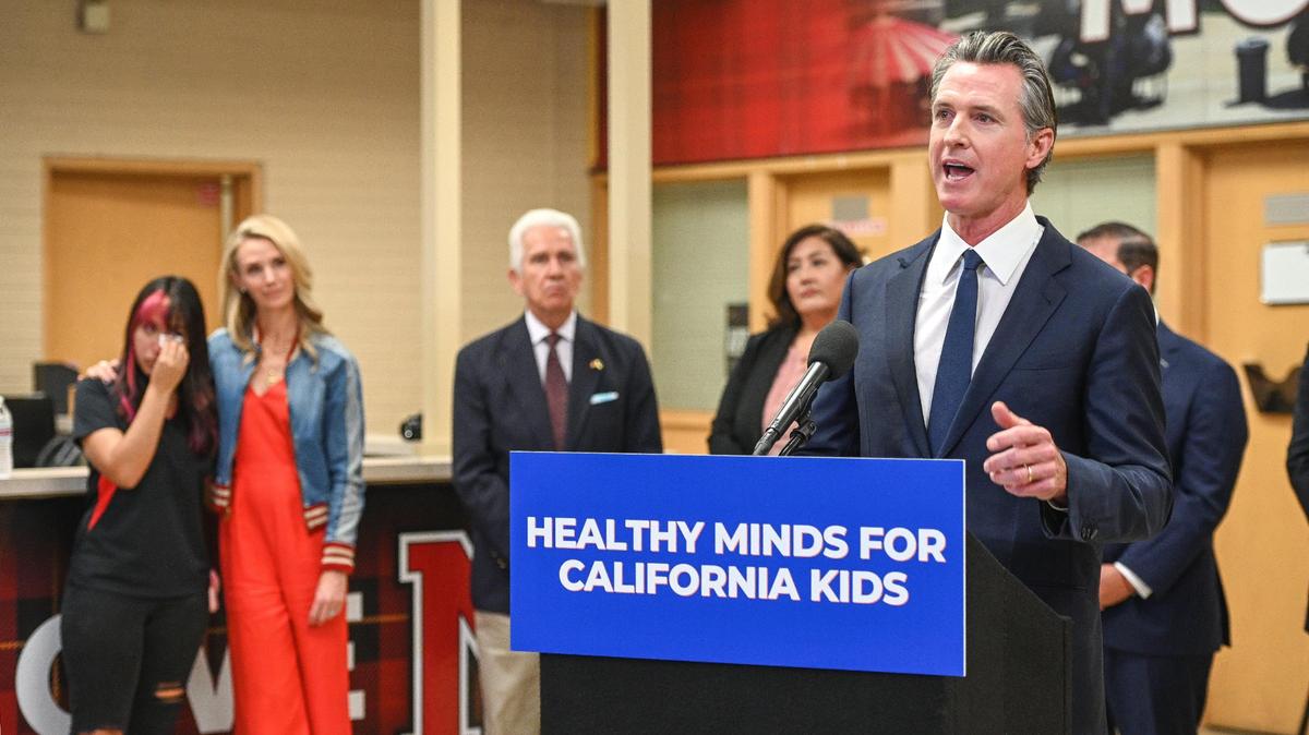 Gov. Gavin Newsom announces new funding for mental health and substance abuse support for young Californians, during a visit to McLane High School in Fresno on Aug. 18.