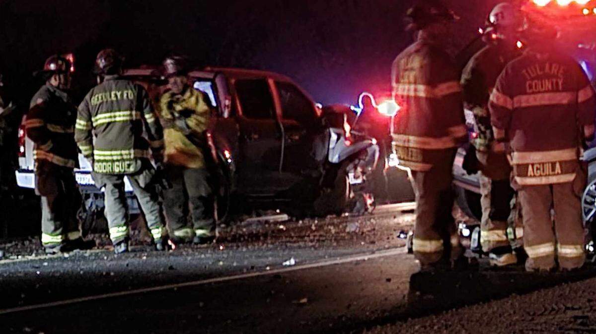Emergency personnel on the scene of a fatal crash near Reedley on Sunday, Dec. 3, 2023.