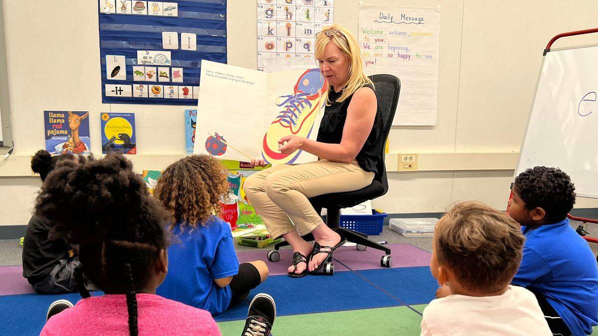 Pyle Elementary School teacher Julia Landon reads to students. Pyle Elementary is one of the Fresno Unified schools that provides a Designated Schools program, offering 30 additional minutes of instructional time per day for students to close the achievement gap.