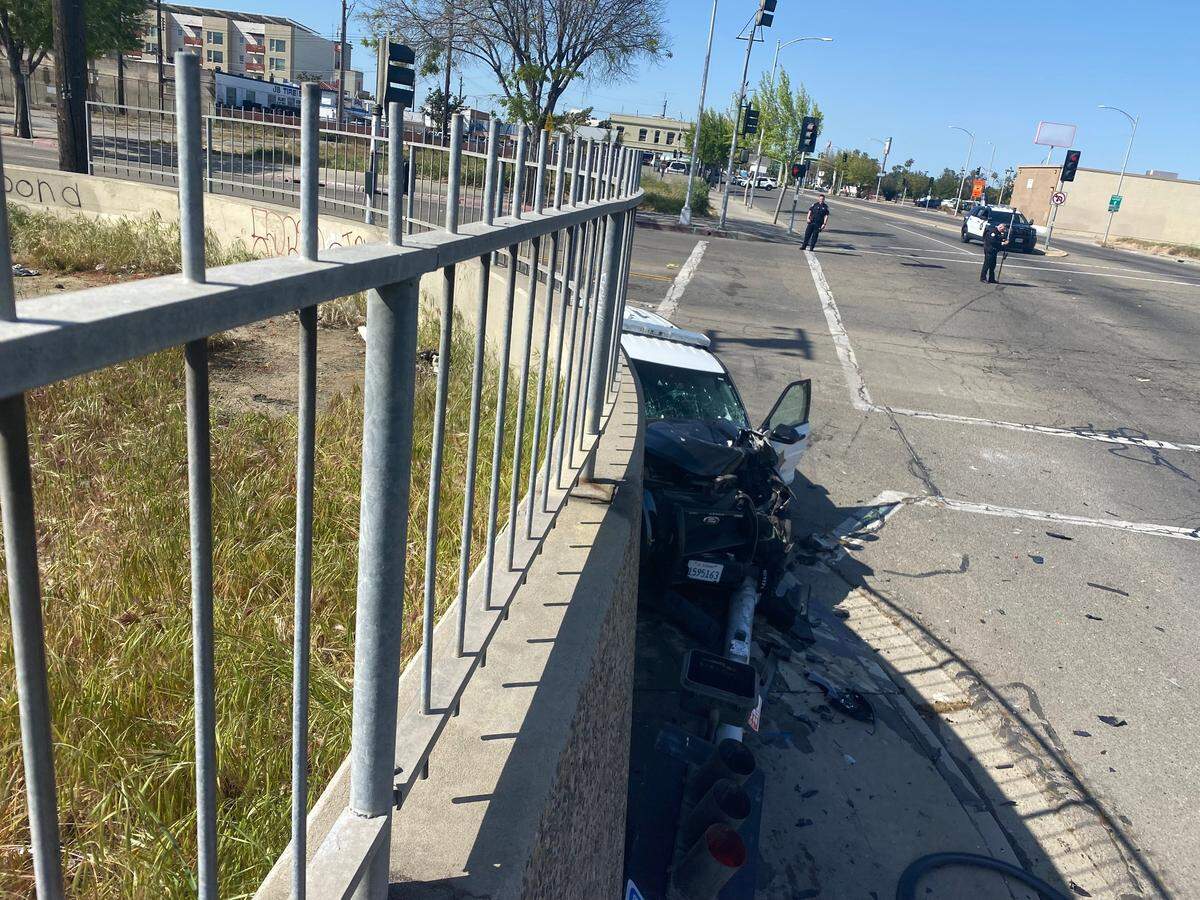 A Fresno police officer was involved in a crash with a Honda while responding to a call on Friday, April 14, 2023.