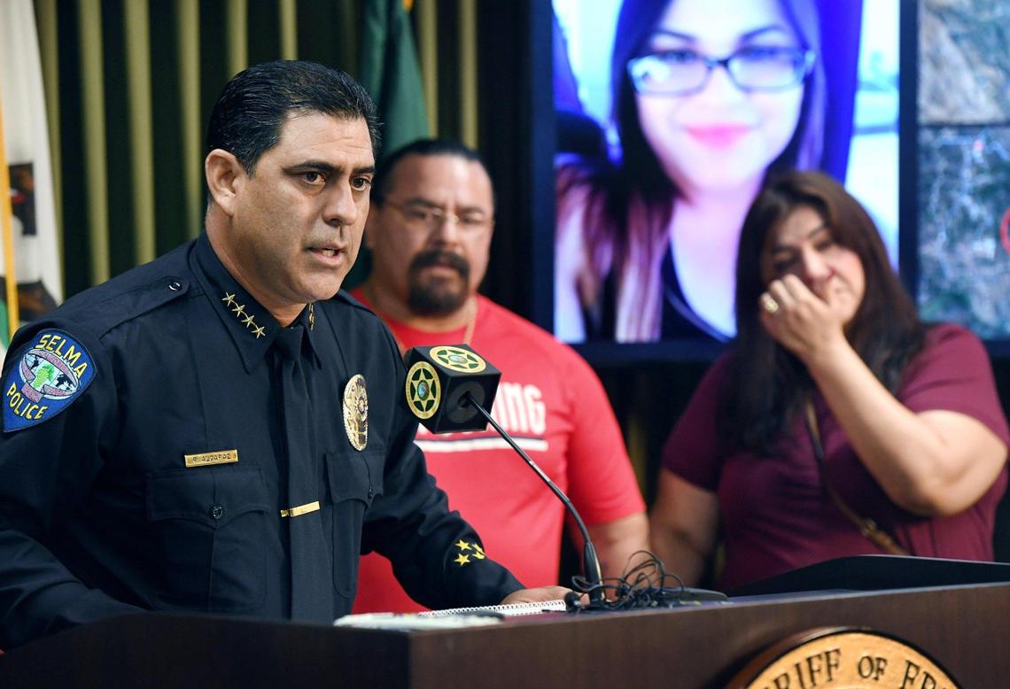 Selma Chief of Police Rudy Alcaraz, left, with Jolissa’s parents Joey Fuentes, center background, and Norma Nunez, right, announces the finding the crash site and body of Jolissa Fuentes during a press conference Tuesday, Oct. 11, 2022.