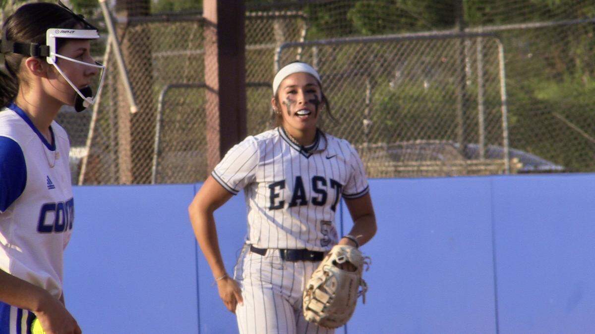 The City’s Katrina Rodriguez of Clovis East gets ready for Madera’s Natasha Griffin to throw a pitch during the City/County All-Star high school softball game on Wednesday, June 21, 2023.