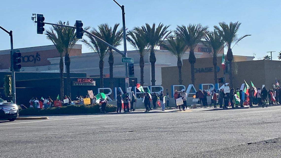Demonstrators gather early Sunday, Jan. 12, 2025.