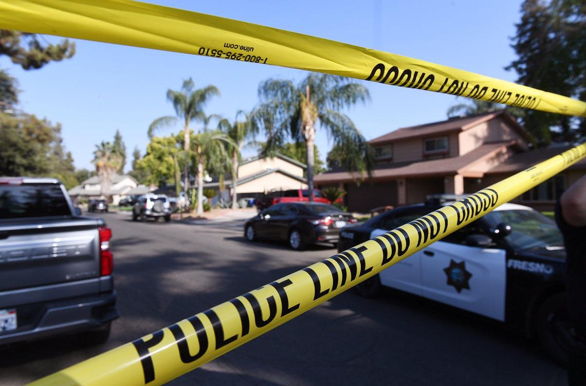 Police tape blocks off east Orleans Avenue at south Sylmar Avenue, where Fresno Chief of Police Paco Balderrama explained the details in a complicated case involving a carjacking and shooting that began in Selma and ended with the suspect’s death in Fresno on Saturday, Sept. 4, 2021.