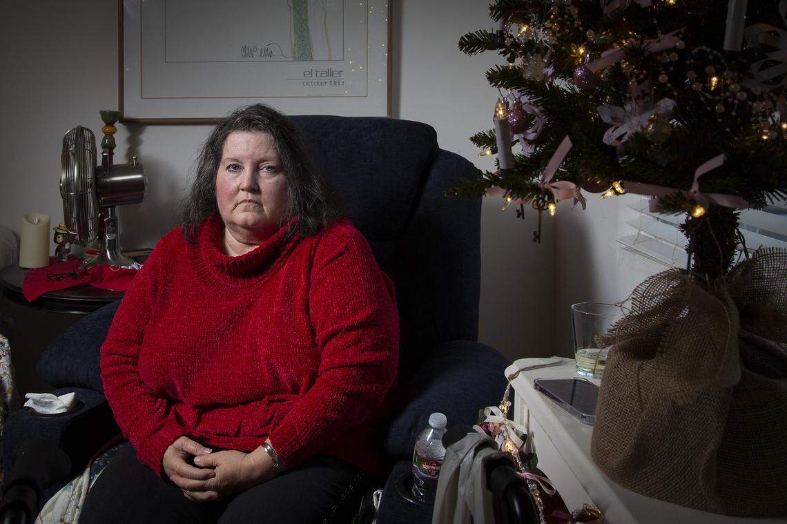 Coreen Arioto, 60, MSN, RN, FNP-C, sits in the living living room of her home she shares with her mother in Ojai on Dec. 4, 2021. Photo by Julie Leopo for CalMatters