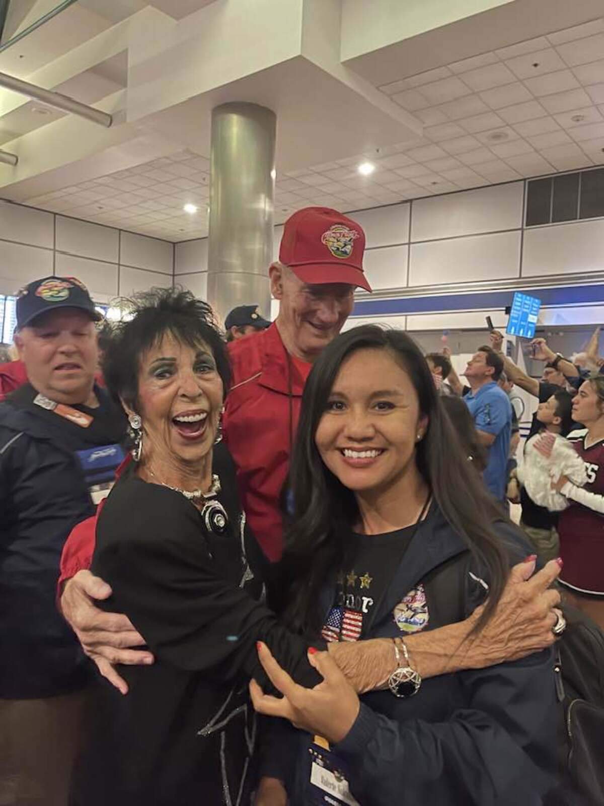 Marie V. Theurich and 2011 Miss Fresno County Valerie Salcedo greeted Col. George Stewart Roller upon his return from an Honor Flight in October 2023. Theurich died Feb. 23 at age 86.