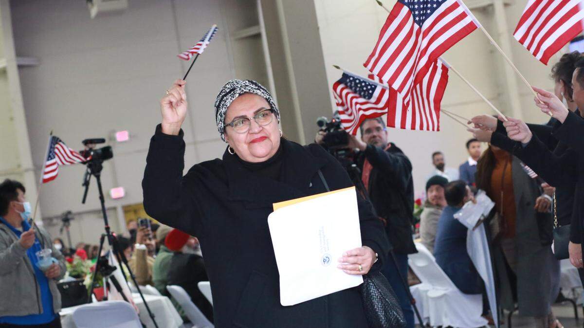 Elizabeth Mazo Arenas who lives in Visalia and is originally from Medellin, Colombia was one of the 99 valley residents from 23 countries who took Oath of Allegiance during a special public naturalization ceremony on Dec. 30 at the Fresno Fairgrounds during the Hmong Cultural New Year Festival.