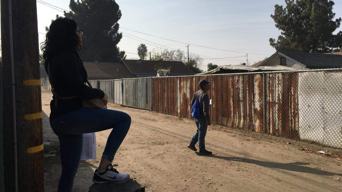 Canvassers working on a pilot project for the Central Valley Immigrant Integration Collaborative walked through alleyways in Fresno to identify "unconventional" housing units likely not counted in the Census.
