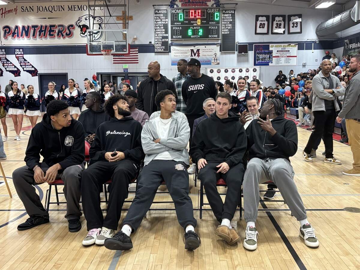 Players from the Phoenix Suns looks on during Jalen Green’s jersey retirement at San Joaquin Memorial on Wednesday, Nov. 19, 2025.