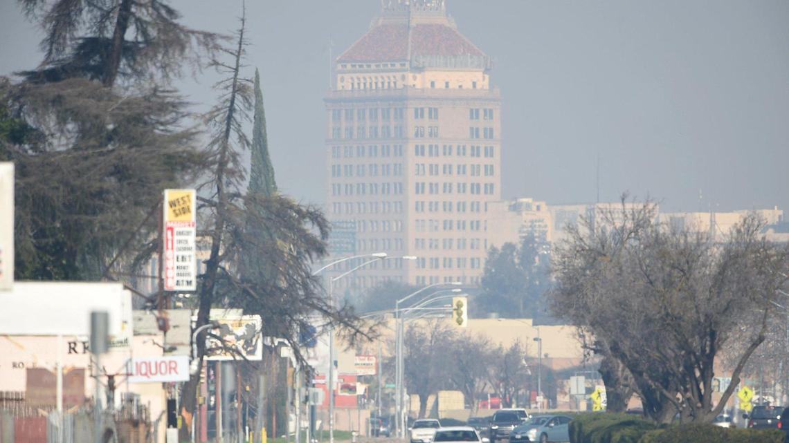 The Pacific Southwest Building as seen north on Elm Avenue through the haze of dirty air.