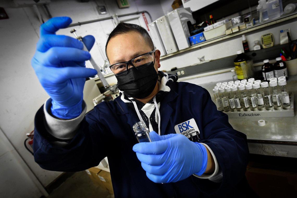 John Her, BSK Associates lab technician, runs tests on drinking water, Dec. 29, 2021. The water testing facility has had 13 PG&E power outages over 30 days, costing $50 thousand each outage, along with overtime due to retesting, and loss of equipment.