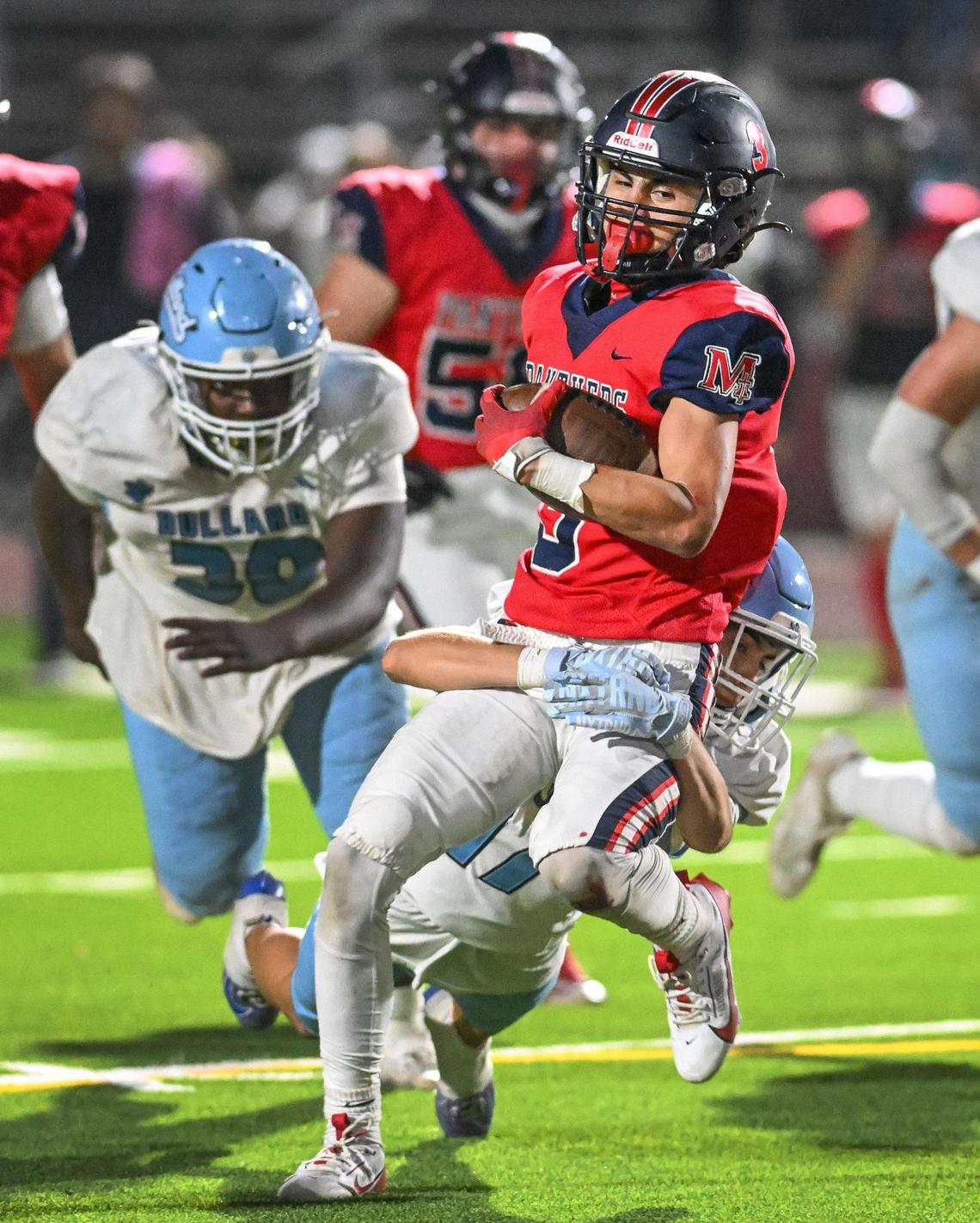 Memorial’s Andrew Garcia gets taken down after a run up the middle against Bullard during their game at San Joaquin Memorial on Friday, Oct. 25, 2024.