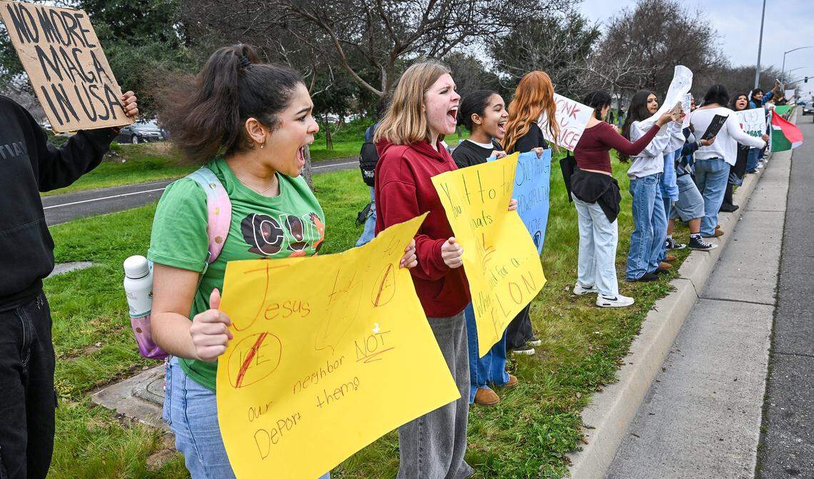 Students from Clovis Unified schools hold signs while protesting ICE enforcement on the corner of Shaw and Clovis avenues on Tuesday, Feb. 10, 2026. Several hundred students from area high schools and even Clark Intermediate were expected to attend the protest throughout the day. 