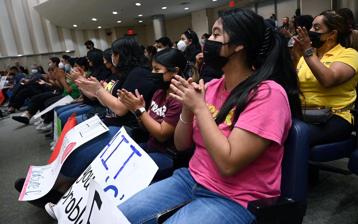 The audience applauds an argument against the initiative at the Fresno Council of Governments (COG) which met to hear public comments and then vote on an initiative to renew Measure C on the ballot this fall Thursday, July 7, 2022 in Fresno.