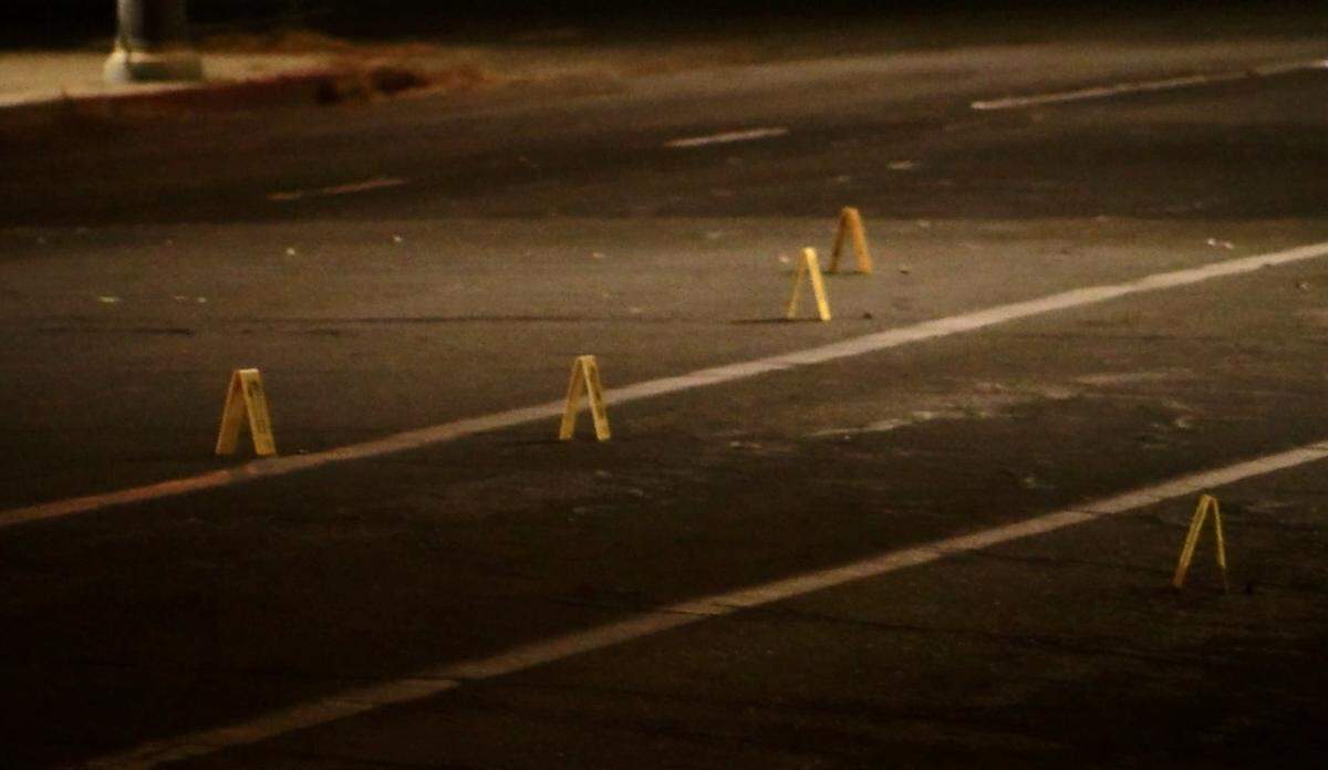 Evidence markers after a woman was shot in downtown Fresno on Monday, June 3, 2024.